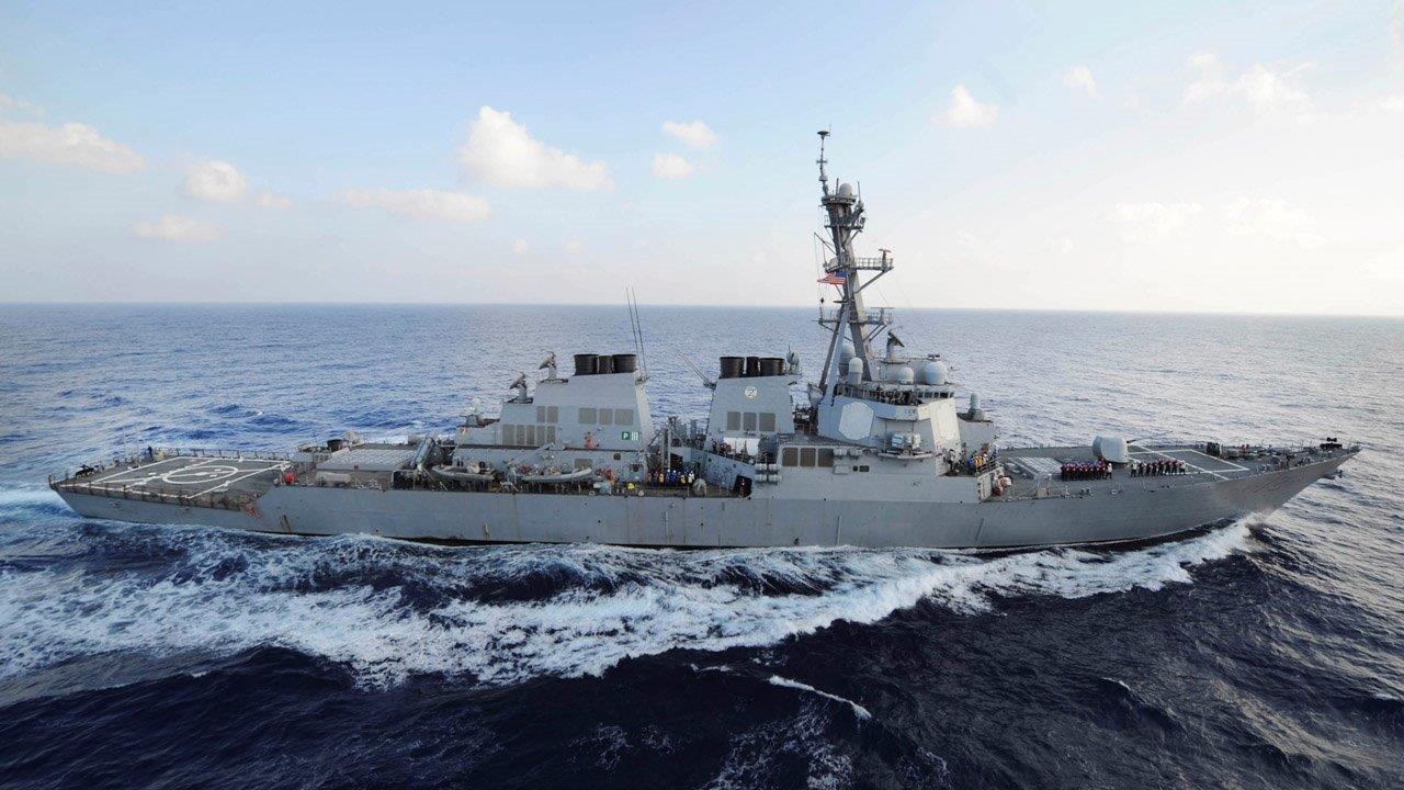 US Navy destroyer warns Iranian vessels