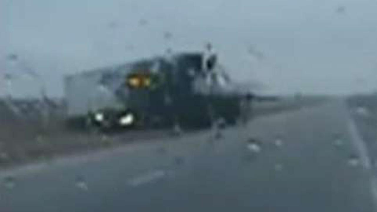 Cop's split-second move avoids head-on collision with truck