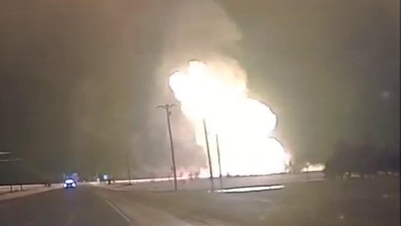 Huge explosion caught on dashcam lights up the night's sky