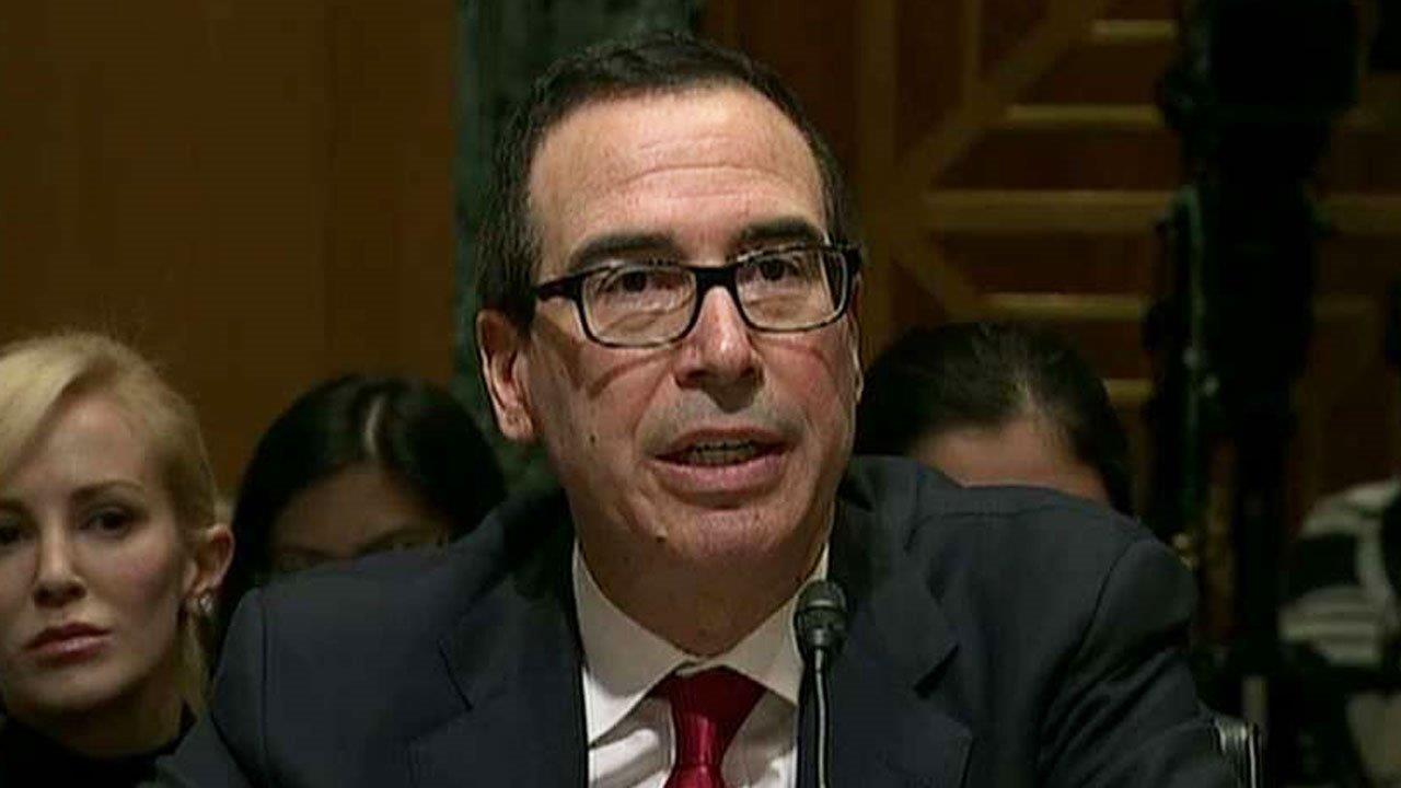 Cabinet nominee Mnuchin questioned over underreported assets