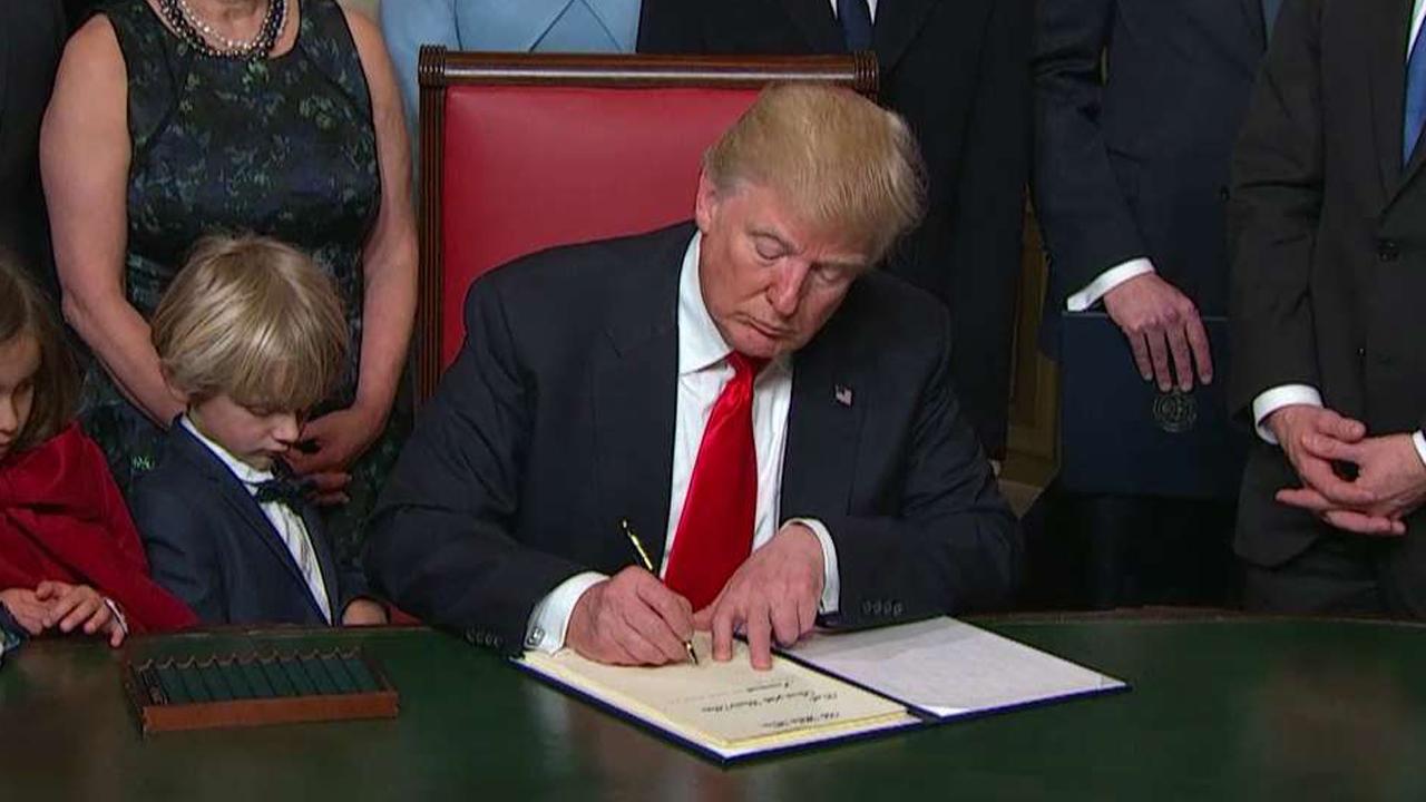 President Trump takes part in signing ceremony