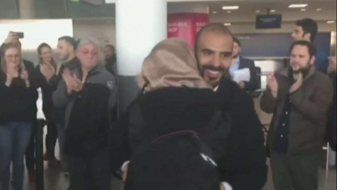 Iraqi man reunites with fiancee who was detained at JFK