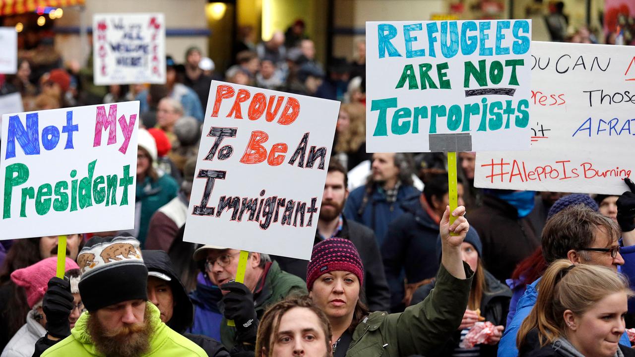 Liberals issue call to action against Trump refugee order