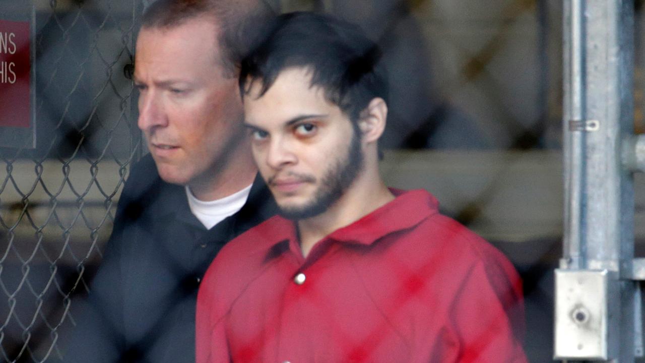 Airport massacre suspect to appear in federal court