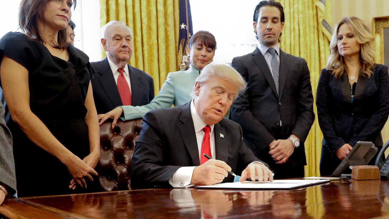 President Trump signs exec. order to cut regulations