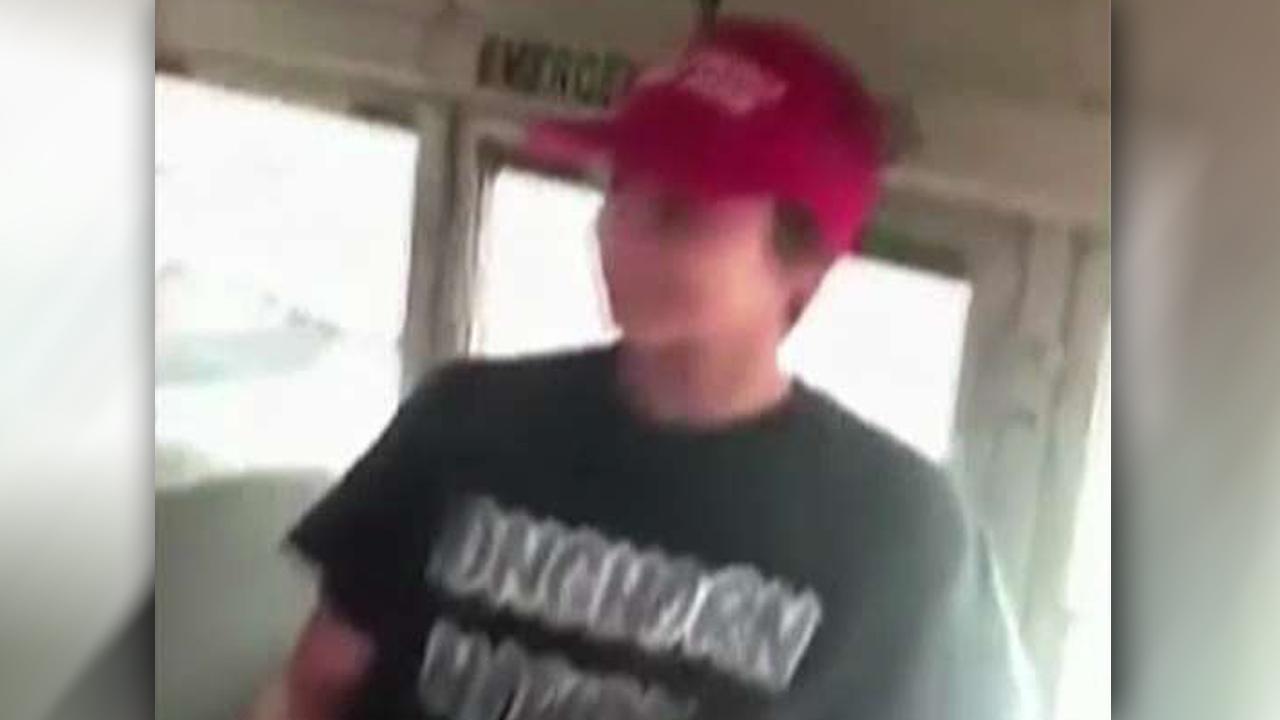 Student wearing Trump hat attacked on school bus, suspended