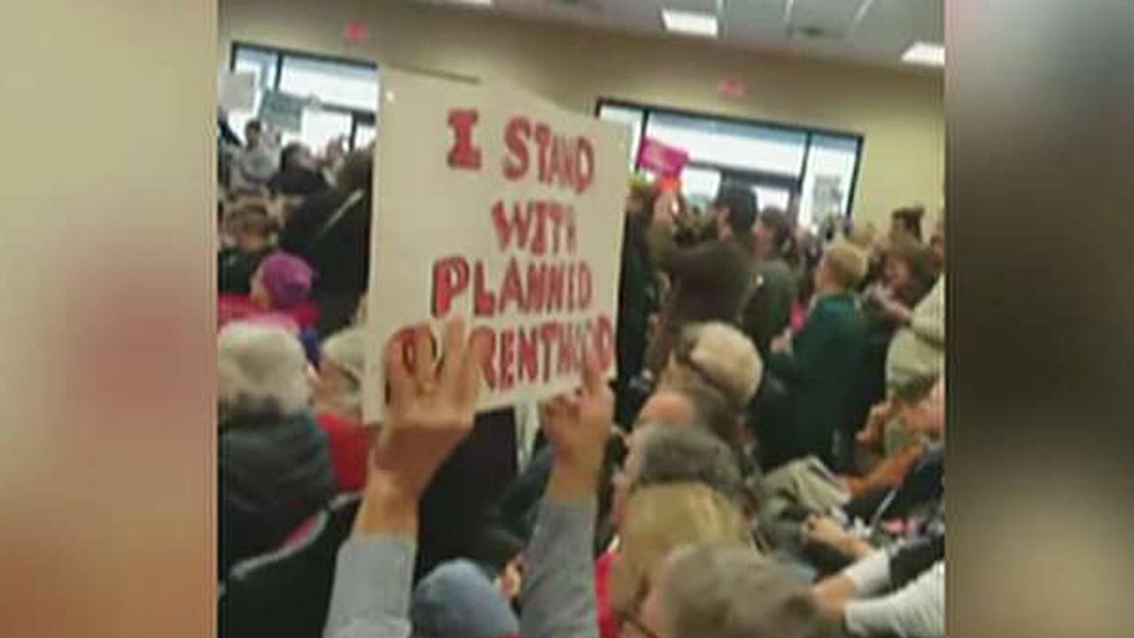 Protesters target GOP lawmakers during town hall events