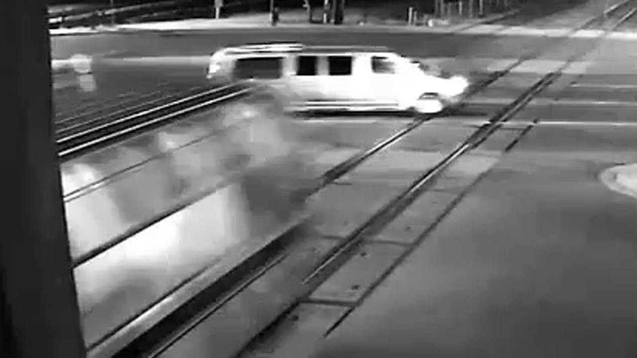 Van appears to purposely drive into train's path in crash
