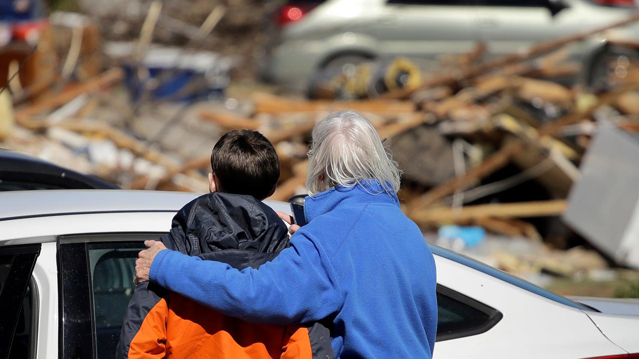 Tornado-ravaged community fears new threat: looters