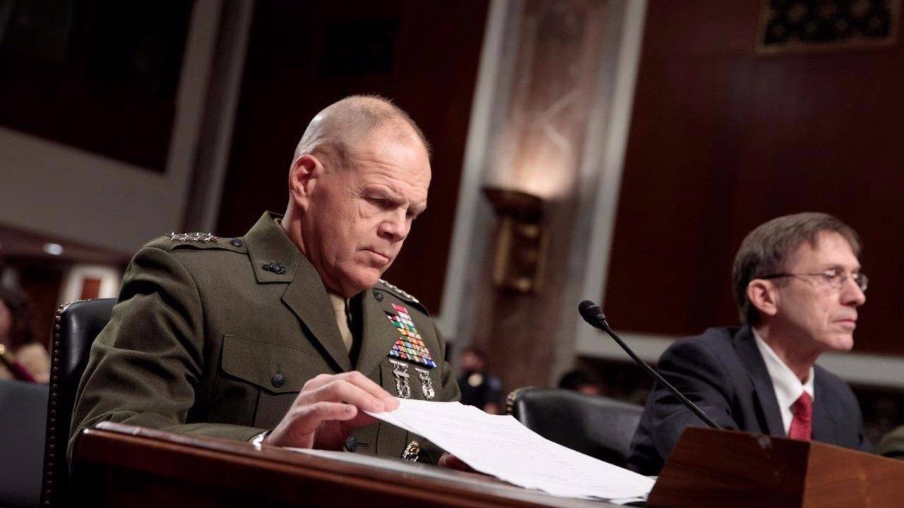 Marine Corps official questioned on nude-photo scandal