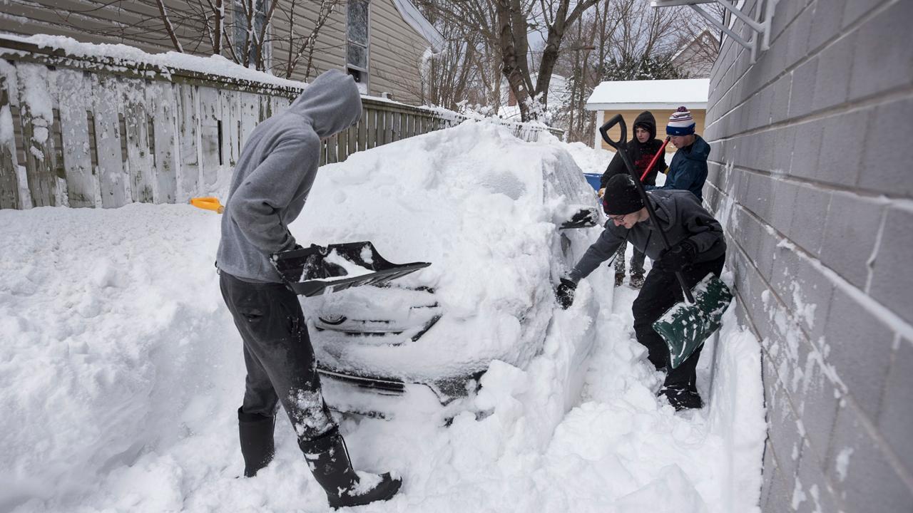 Blizzard brings extreme snowfall totals, grounds flights 