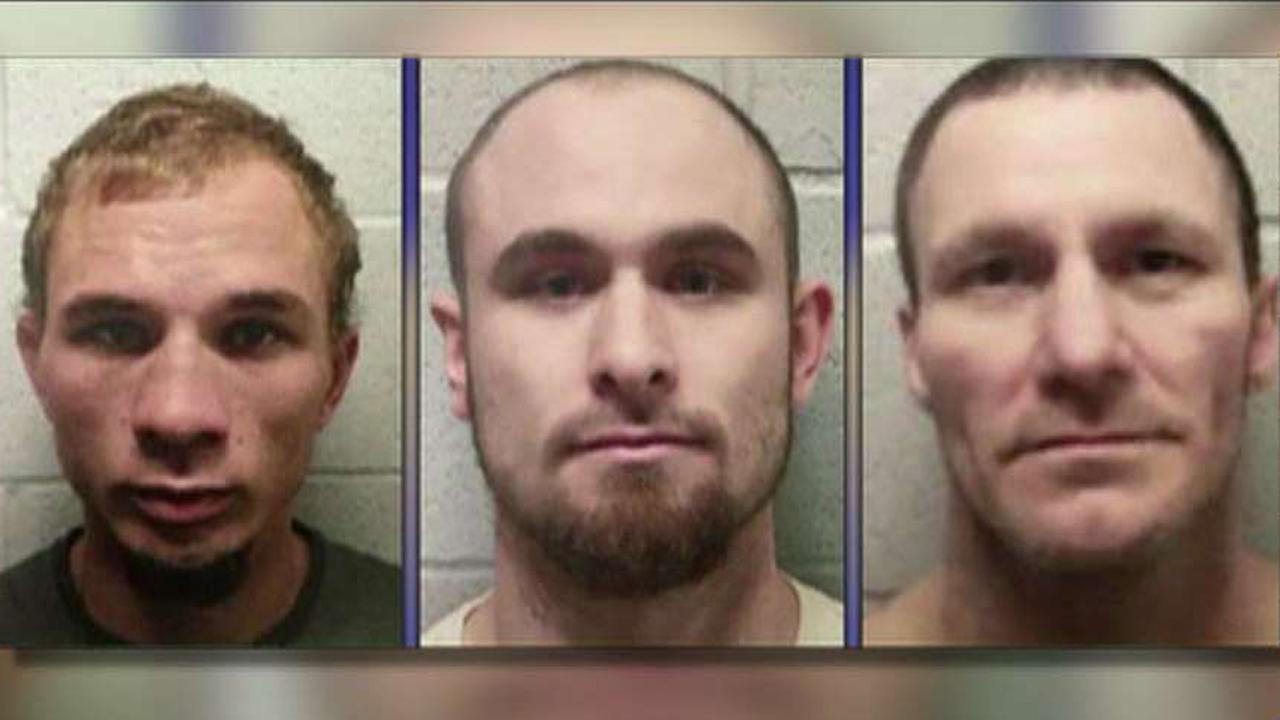 Manhunt for three escaped inmates