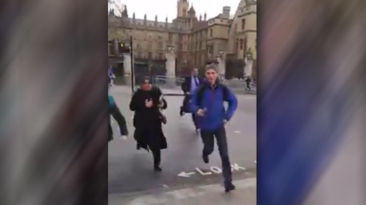 Video catches pedestrians running, shots fired in London