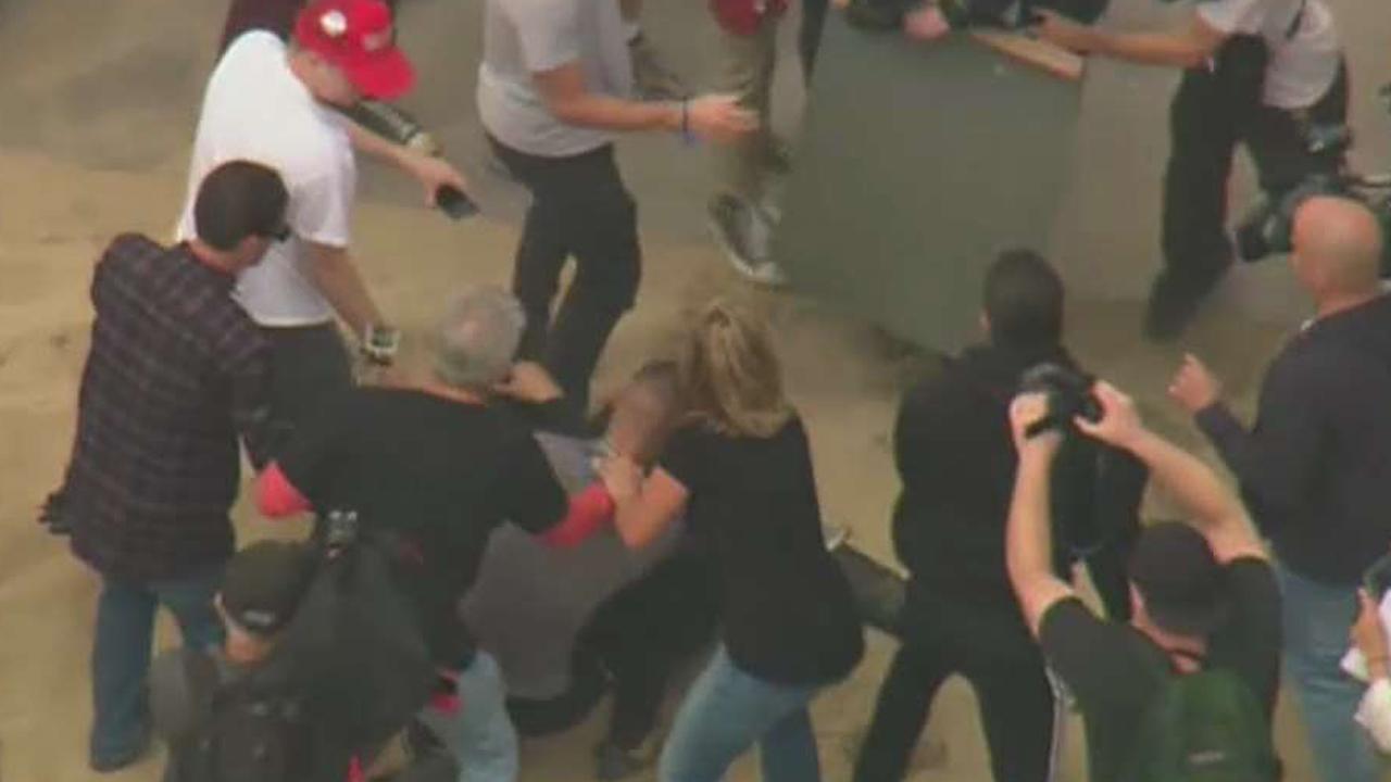 Trump supporters and anti-Trump protesters clash at rally