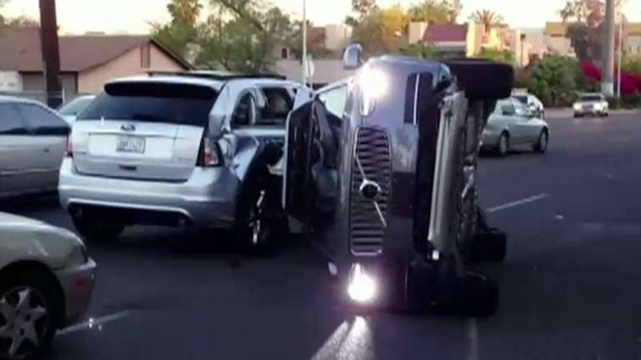 Uber suspends self-driving car program after crash