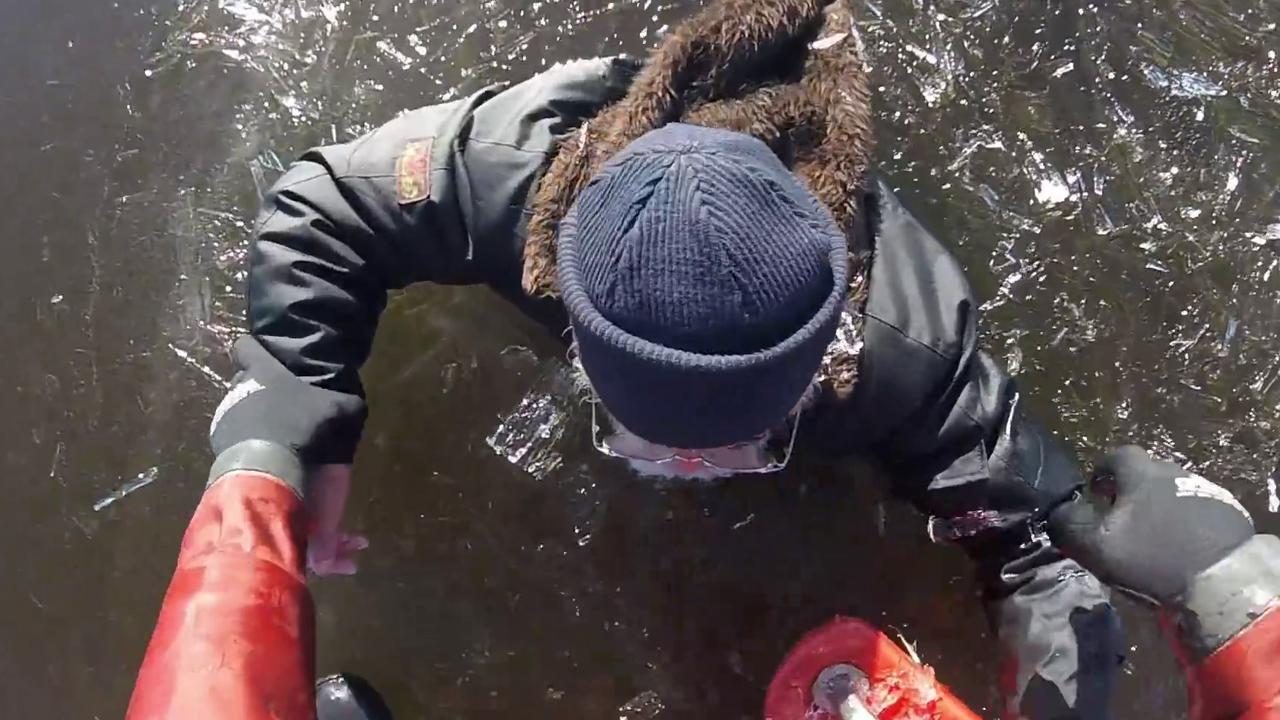 Rescuers rush to save fisherman stuck in frozen lake