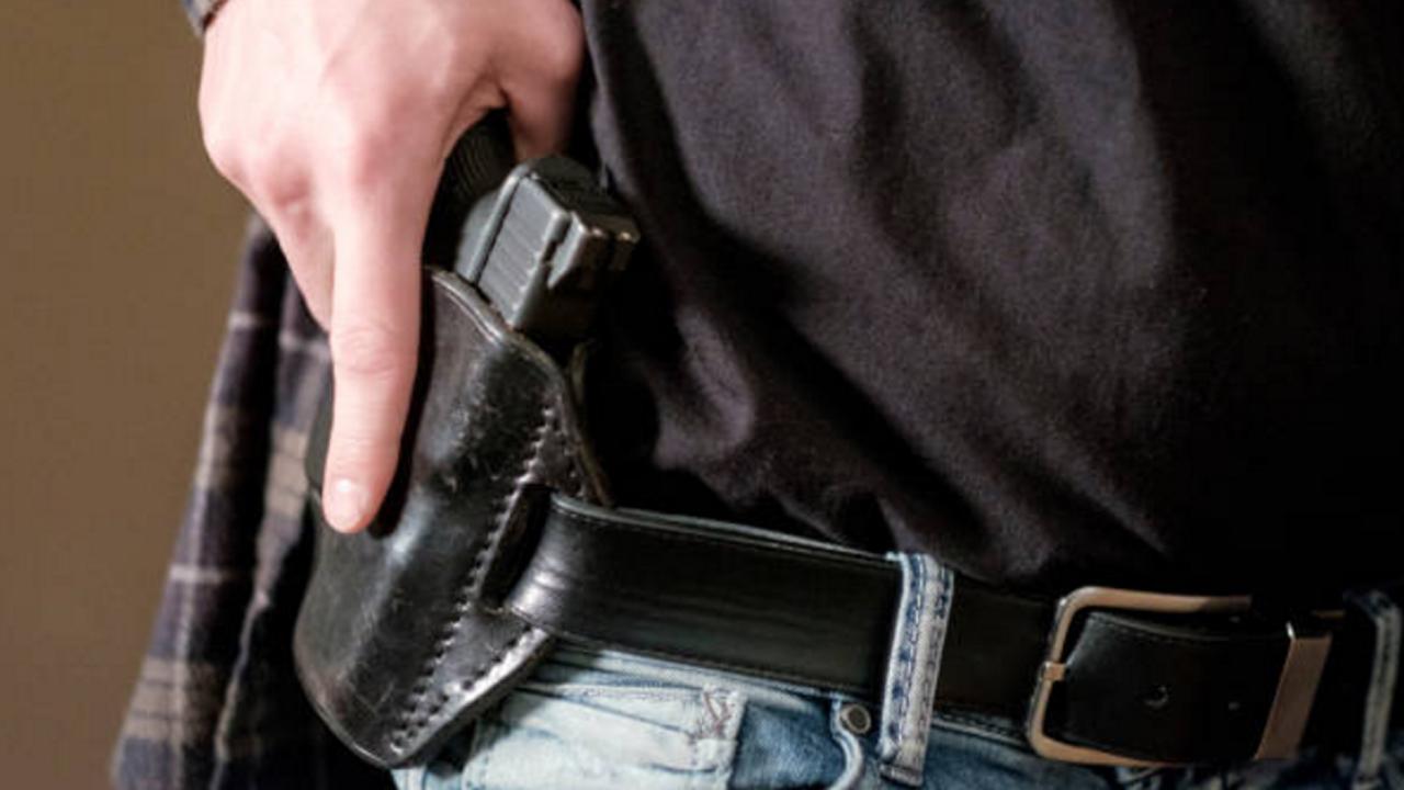 Arkansas Gov OKs guns in bars, churches, on college campuses