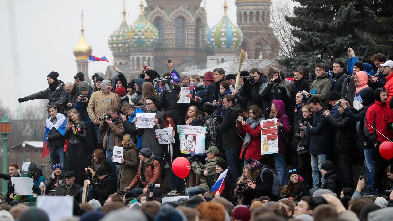 Rare protests across Russia rattle the Kremlin