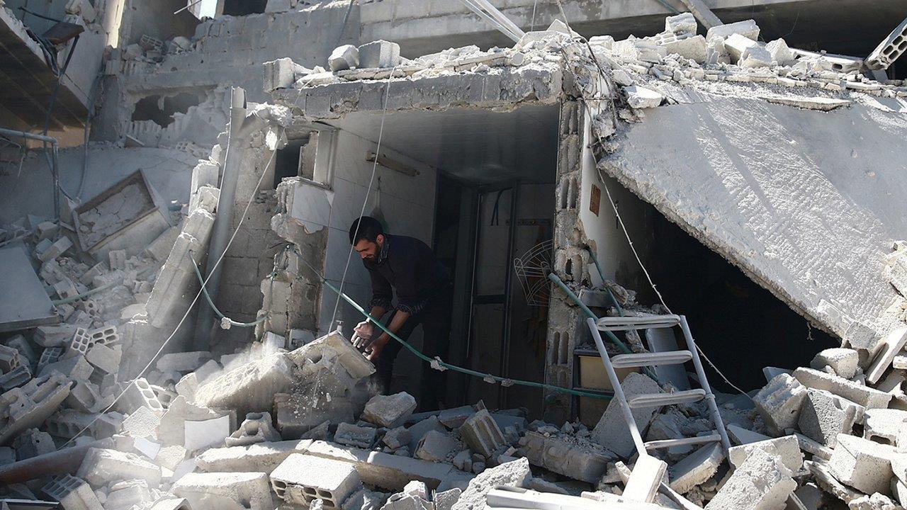 Suspected chemical weapons attack kills dozens in Syria