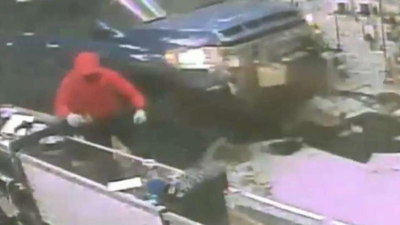 Thieves use pickup truck to smash through wall of gun store