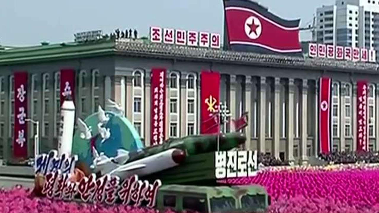 North Korea displays ballistic missiles at parade