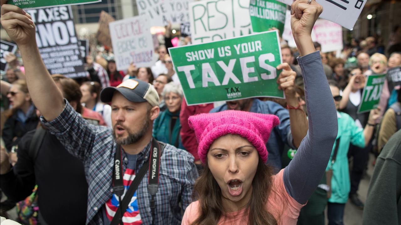 Protesters hold marches across the country on tax day