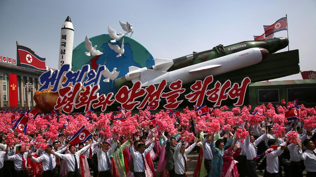 North Korea flaunts missiles in massive military parade