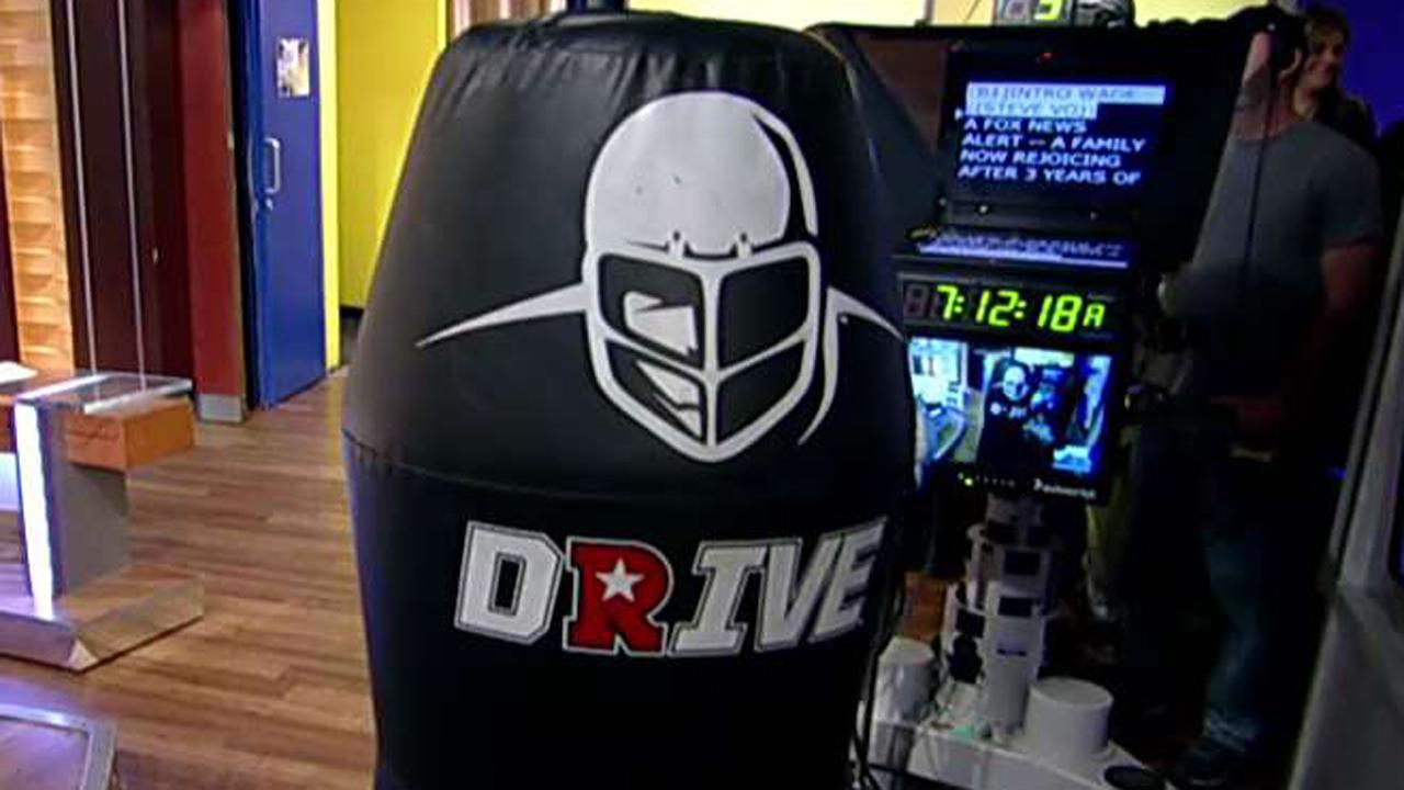 Football gets high tech with robotic tackling dummy