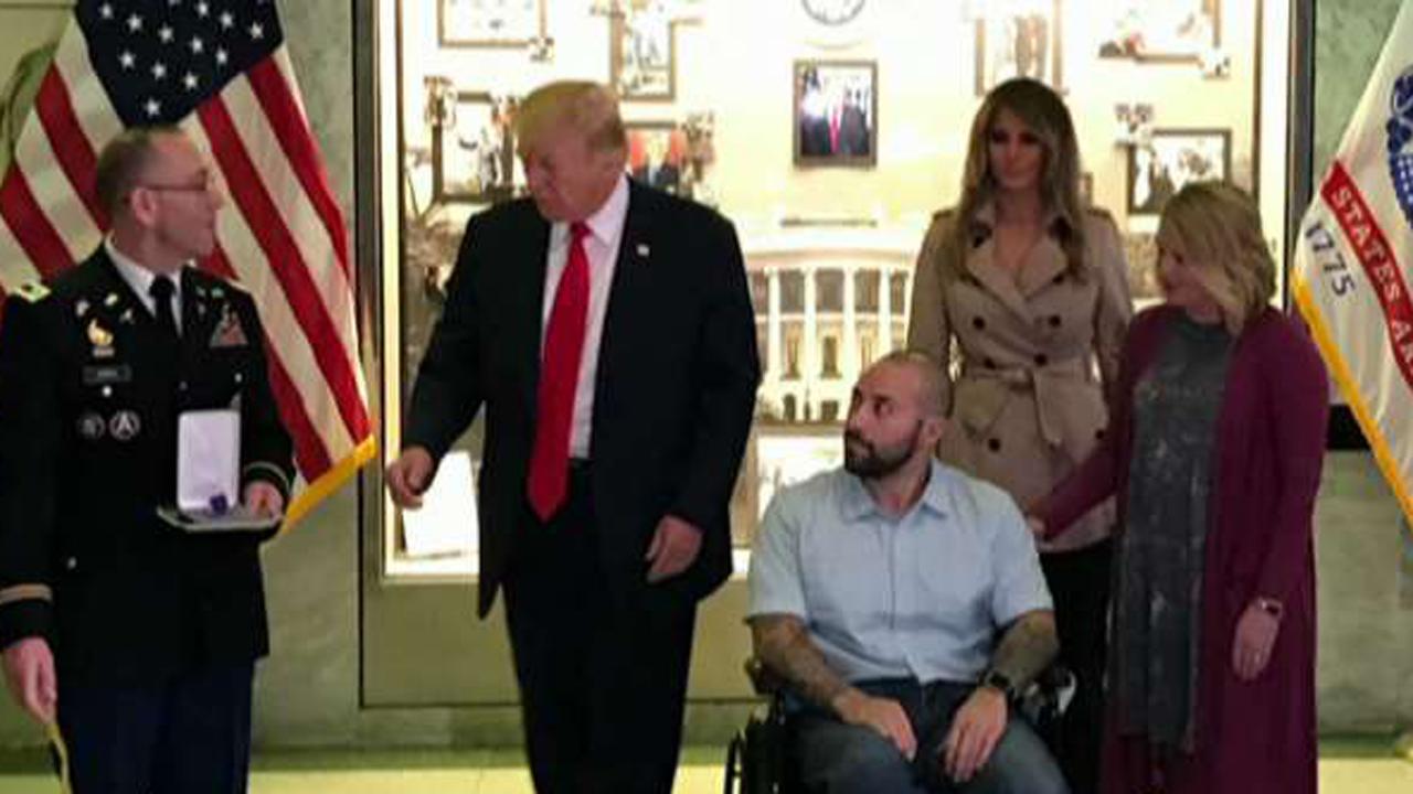 President Trump presents Purple Heart to US service member