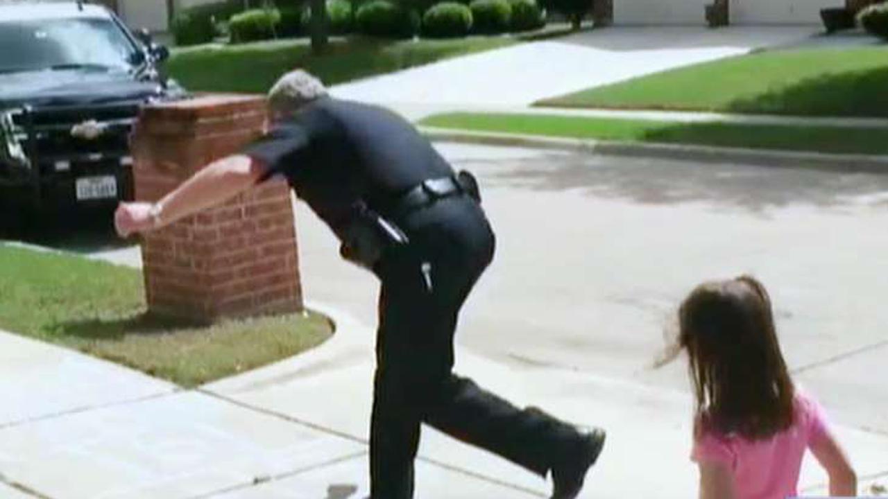 Texas officer skips lunch to hopscotch with little girl