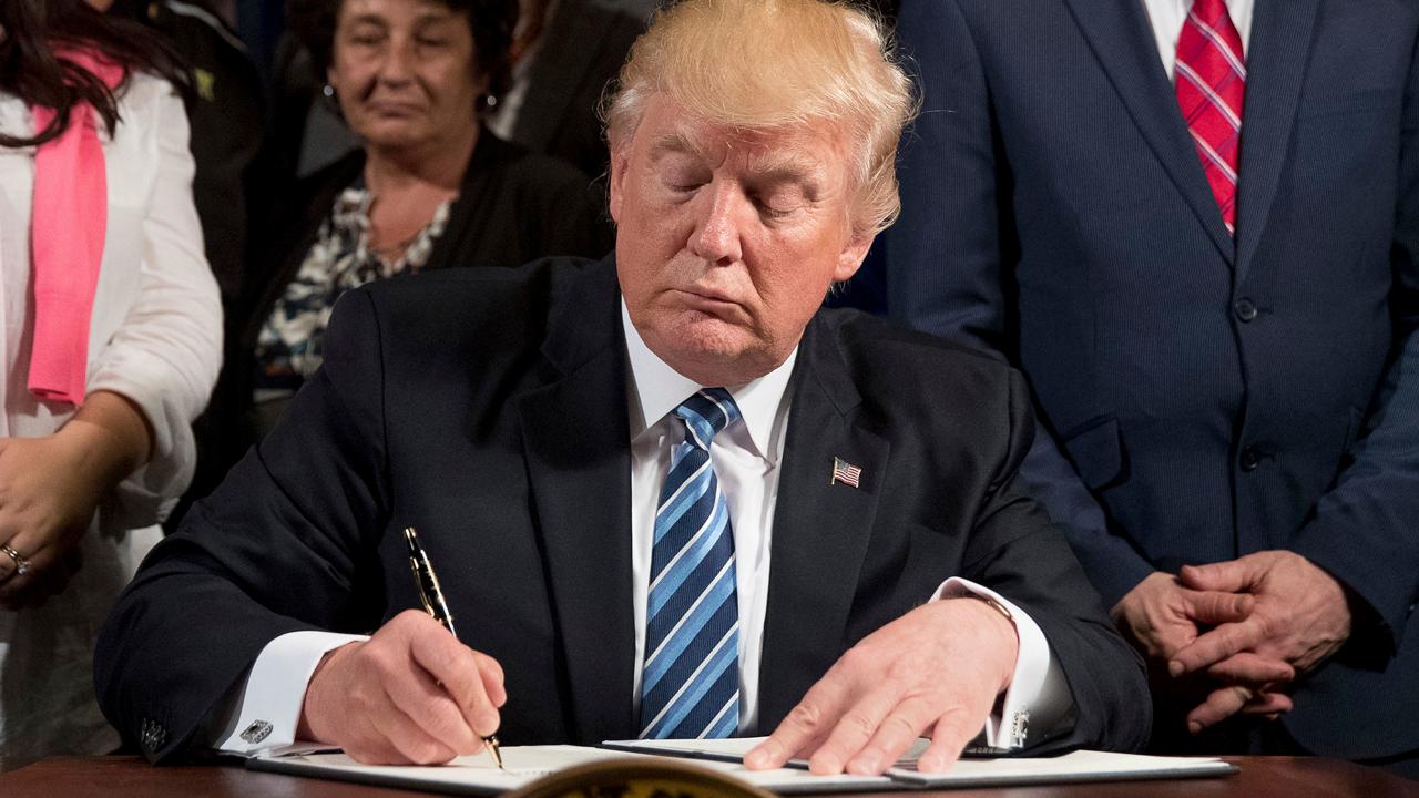 Trump signs executive order to help clean up the VA