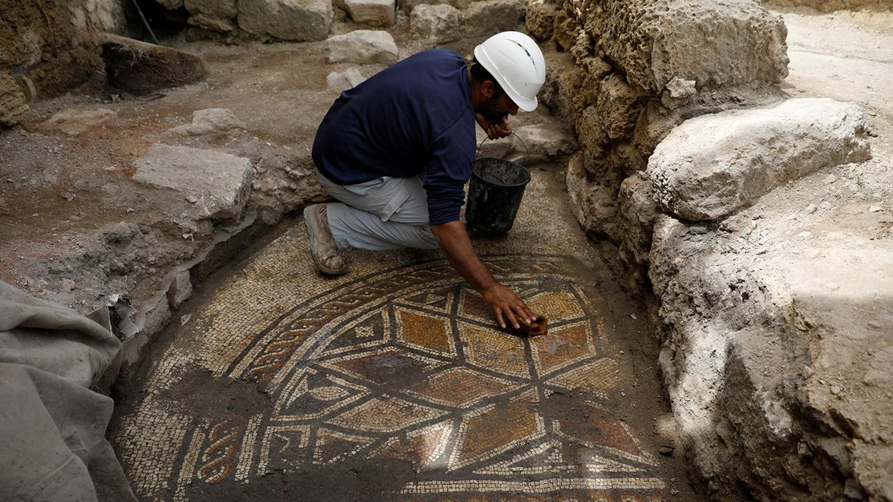 Archaeologists work to restore Roman temple in Caesarea