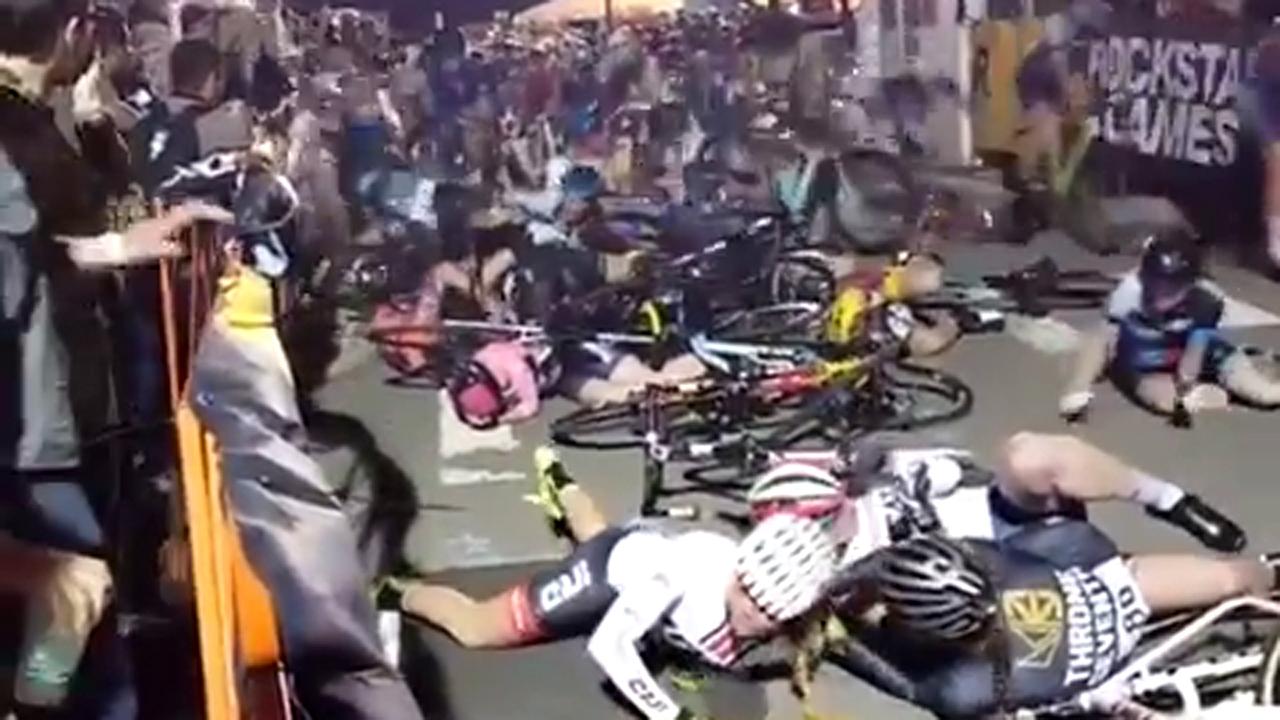 Massive pile-up caused by chain reaction crash in bike race