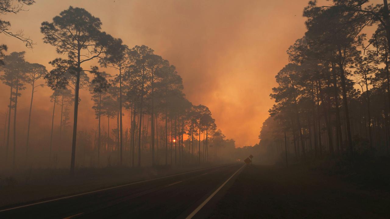 Wildfire rages along Florida-Georgia line