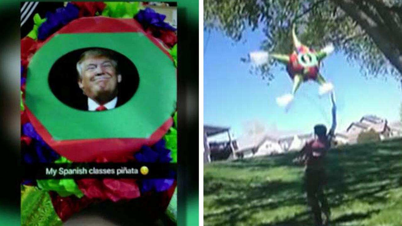 Teacher suspended after urging students to bash Trump pinata