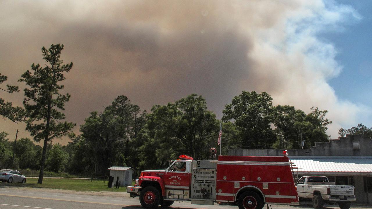 Georgia wildfire threatens to jump state lines into Florida