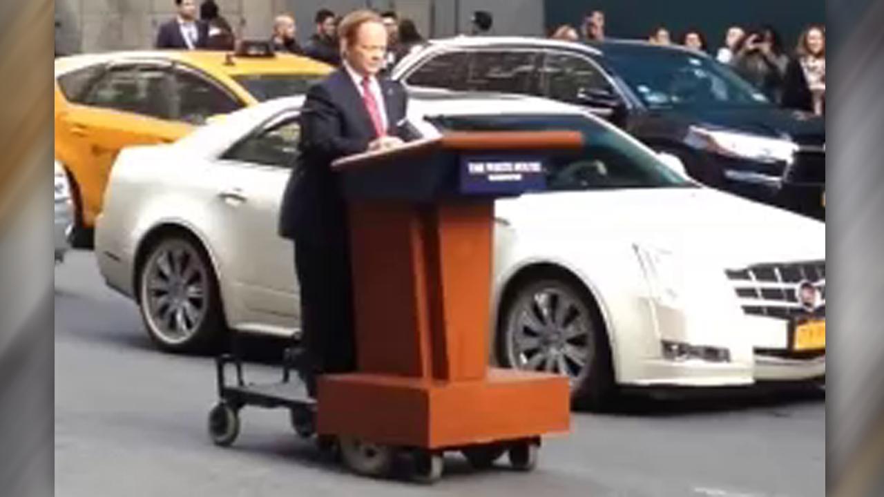 'Sean Spicer' spotted riding podium through NYC