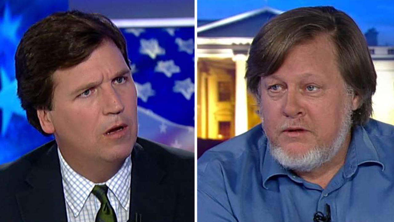 Tucker to activist: Would you like foes to hit you in face?