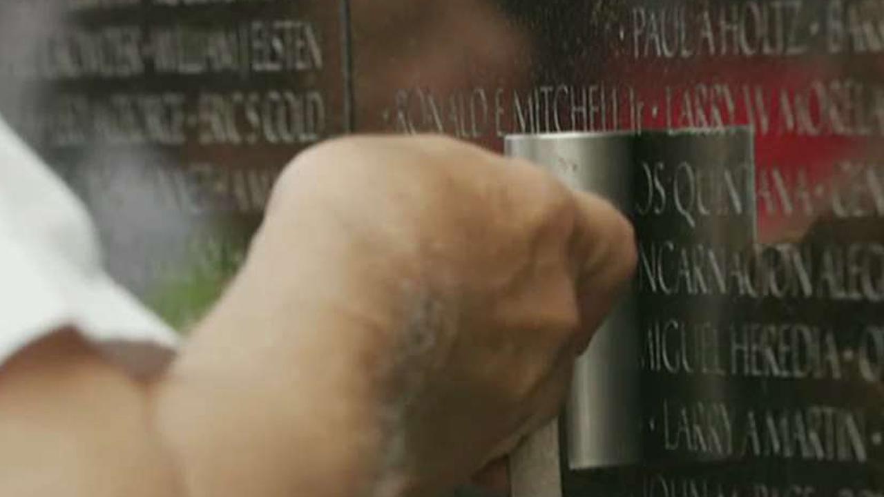 Virtual 'wall of faces' honors fallen of Vietnam War