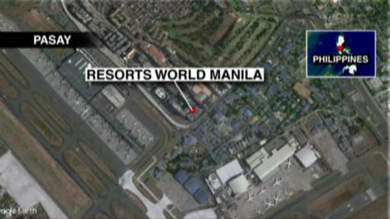 Reports: Men in black hoods stormed Manila resort