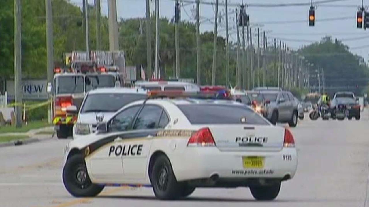 Cops: Former employee kills five, self in workplace shooting