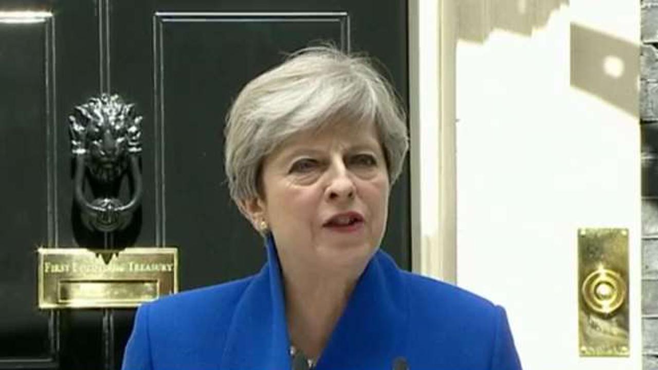 May vows not to resign after her historic miscalculation
