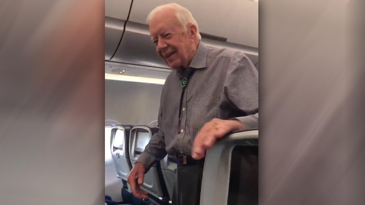 Jimmy Carter surprises airline passengers