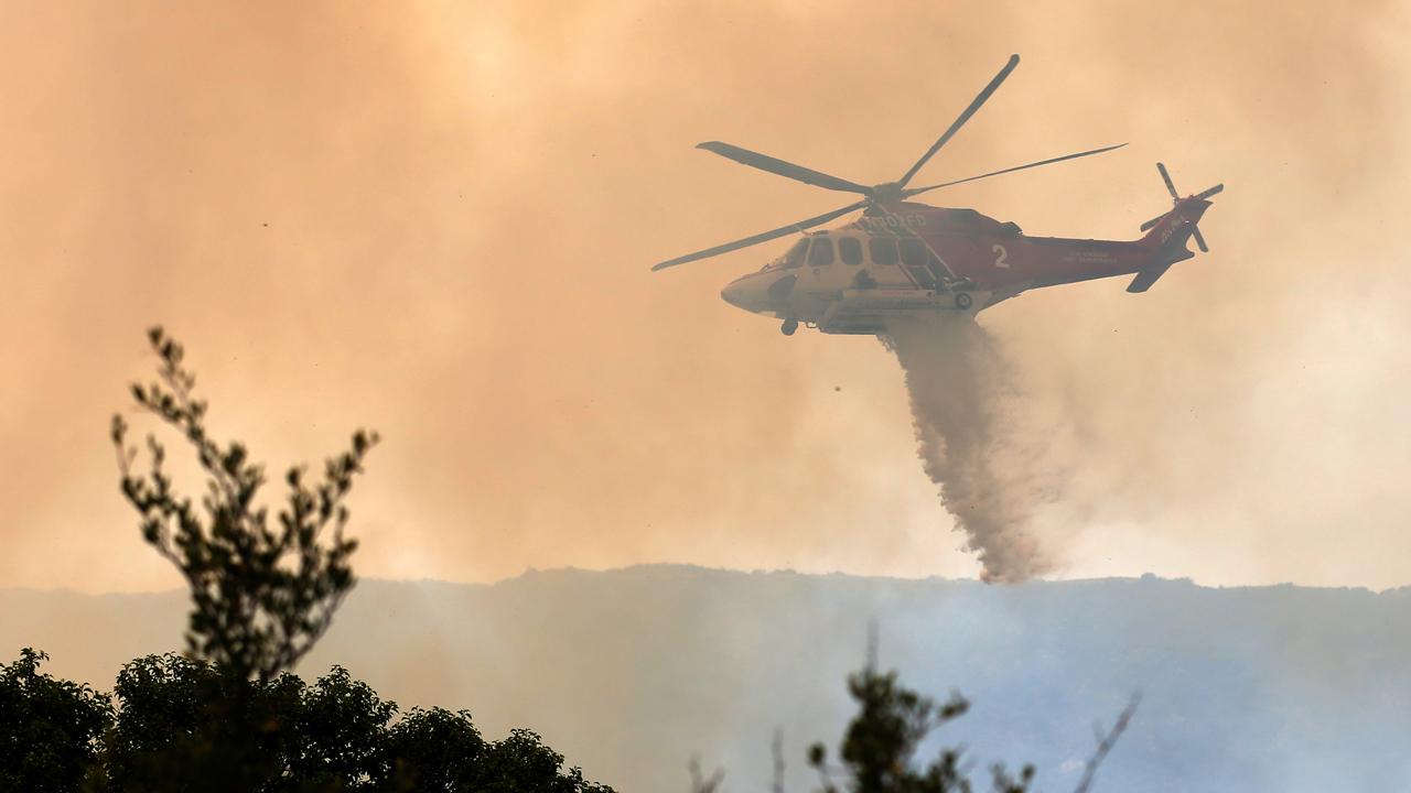 High temperatures, winds complicate Western wildfire fight