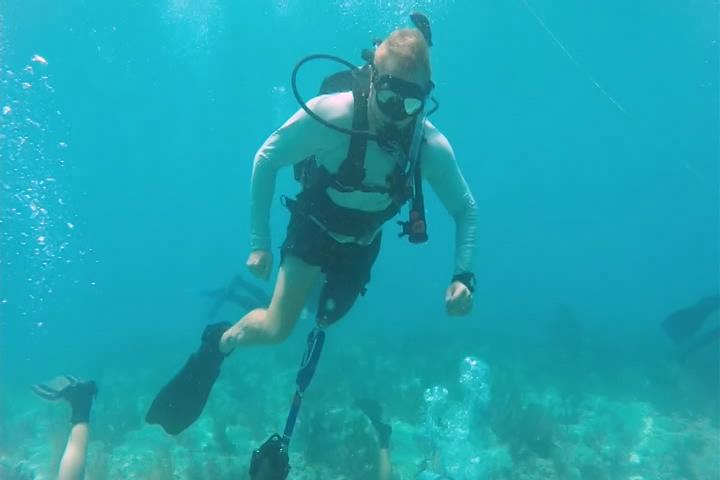 Wounded warriors help save dying coral reef