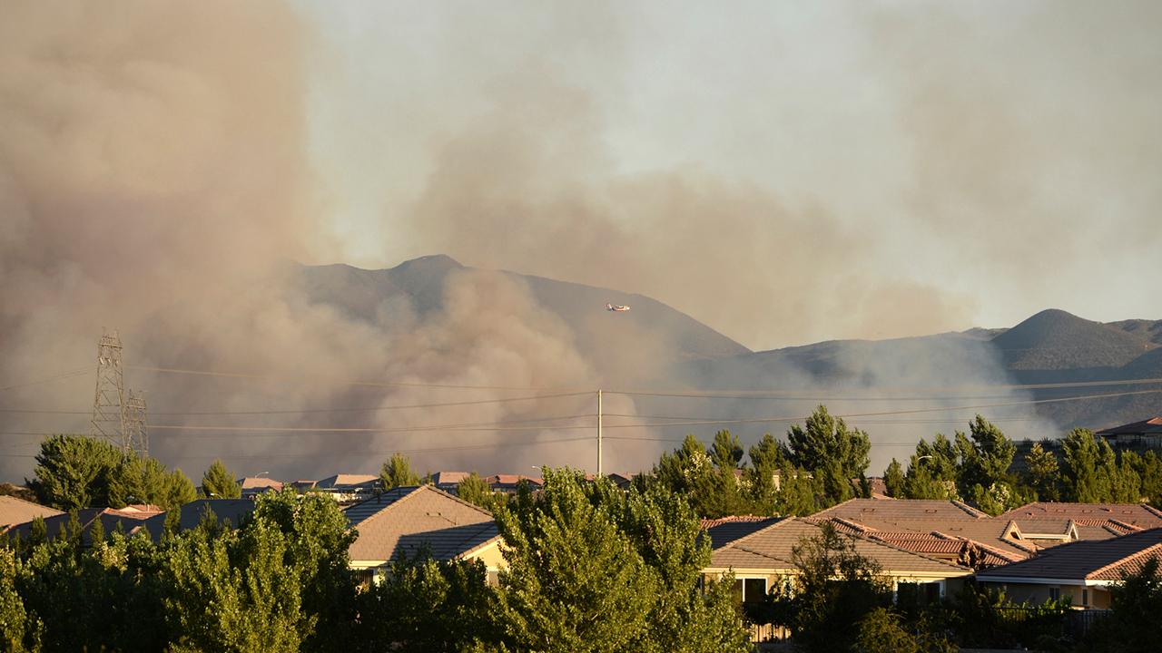Hot, dry conditions fuel western wildfires