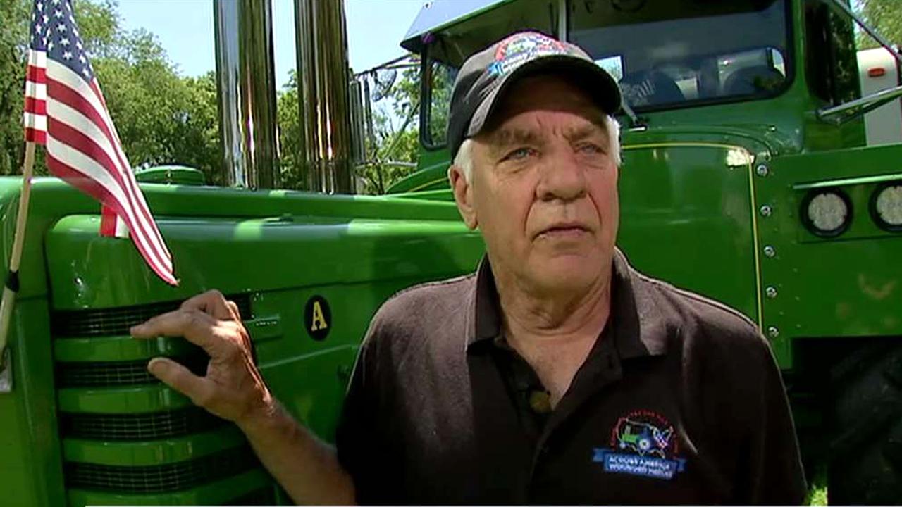 Man drives tractor across the country for wounded veterans