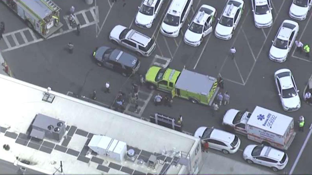 Vehicle drives into group of pedestrians in Boston