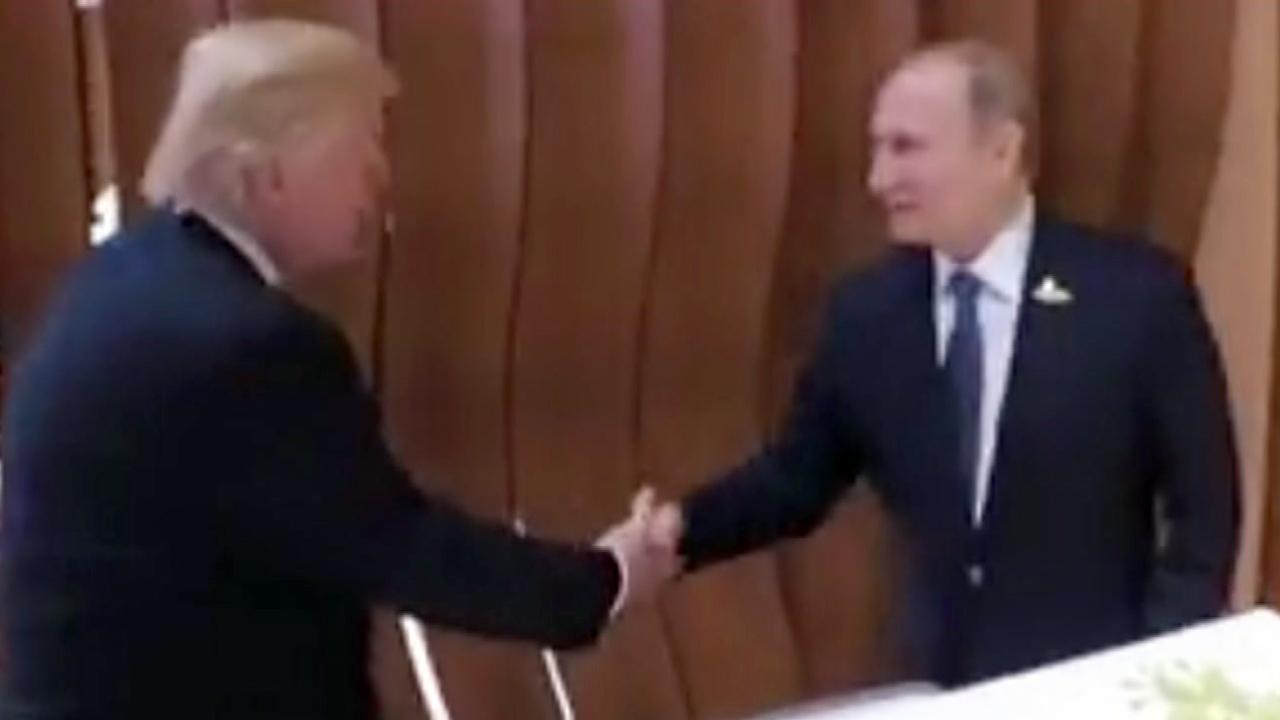 Trump, Putin shake hands ahead of highly anticipated meeting