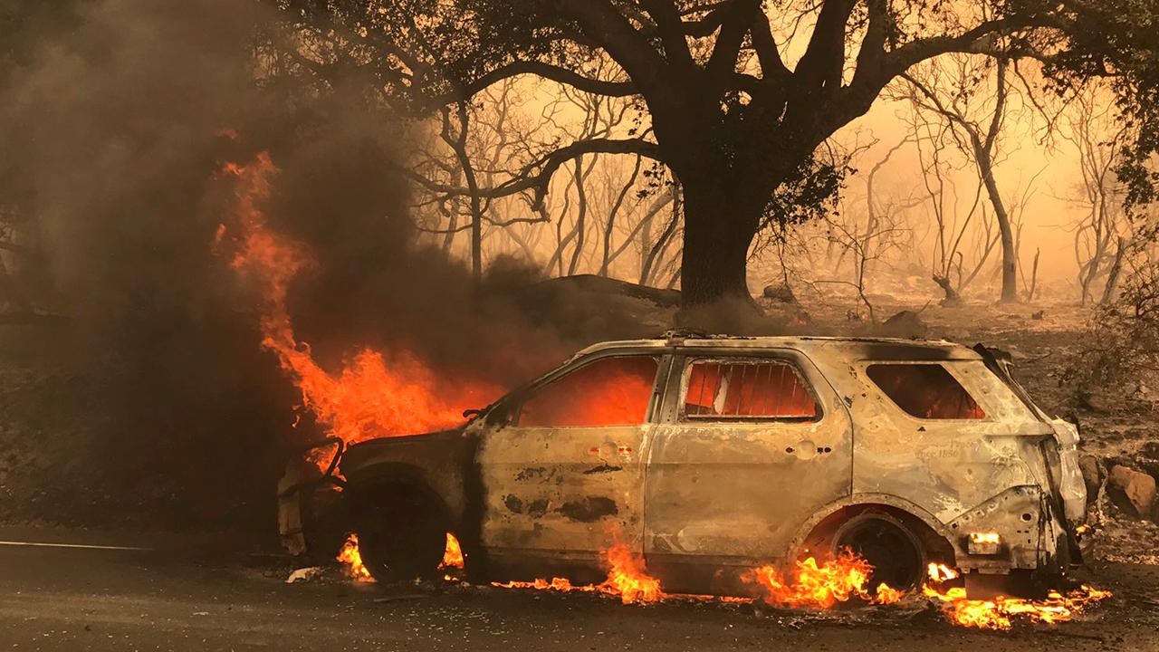 Record heat, dry weather fuel western wildfires